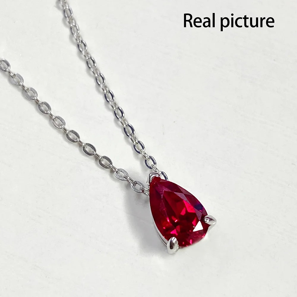 925 Sterling Silver teardrop pendant necklace, set with ruby/moissanite.
