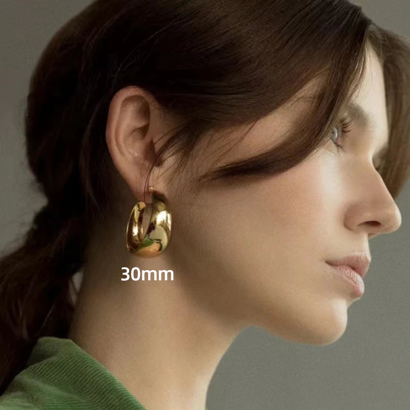 Wide circle hoop earrings, plain, gold plated stainless steel, 25/30 mm, for women