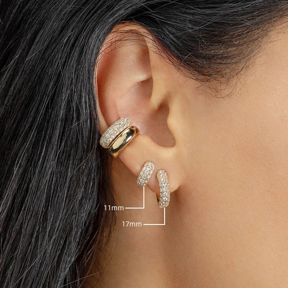Thin gold-plated huggie hoop earrings with CZ/zircon embellishments, minimalist style.