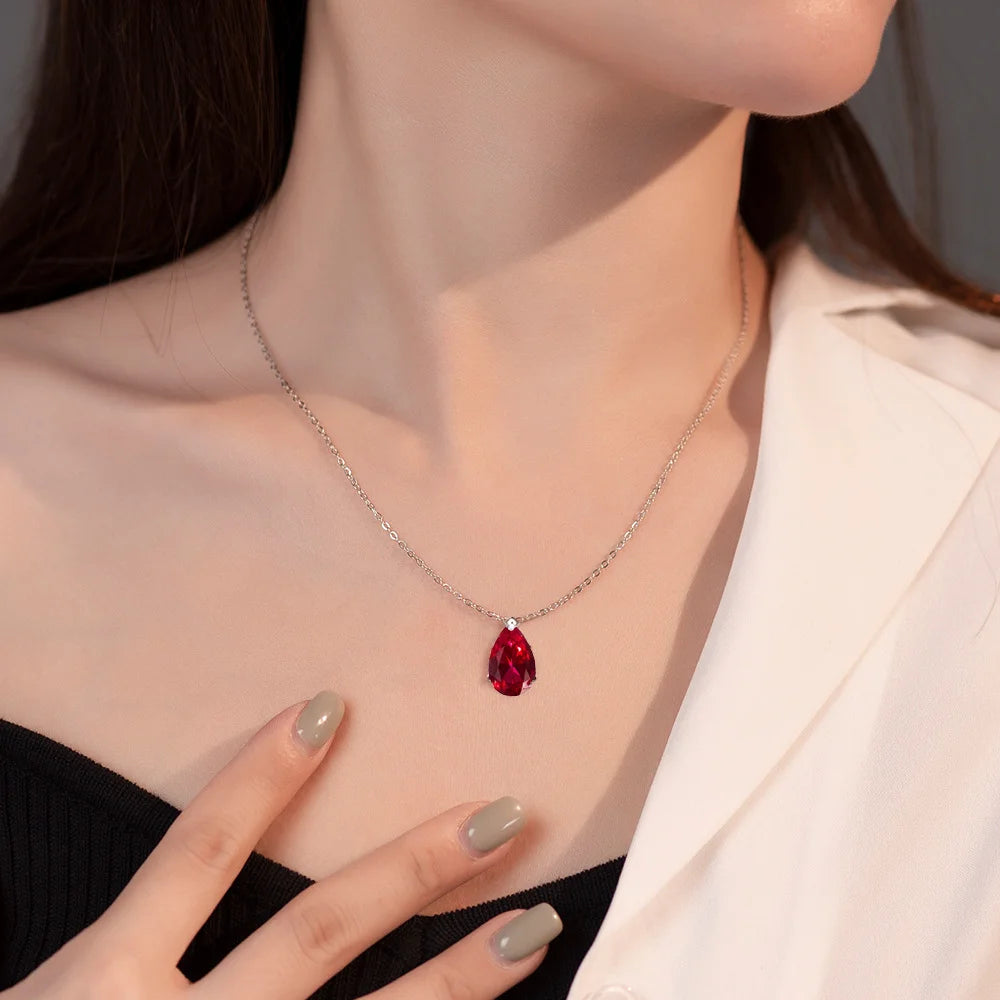 925 Sterling Silver teardrop pendant necklace, set with ruby/moissanite.